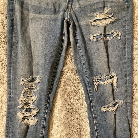 American Eagle | High Rise Super Stretch Skinny Distressed Light Blue Jeans - Picture 2 of 7